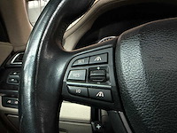 Bmw 750i xdrive high 4.4 v8 executive 408pk 2010 7-serie, l-524-zv - afbeelding 24 van  78