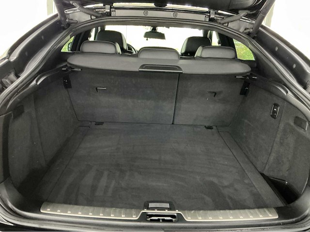 Bmw x6 m e71 | 4.4 v8 biturbo | 555 pk | 2013 | adaptive drive | head up display | comfort access | soft close | top view | btw auto - afbeelding 26 van  45