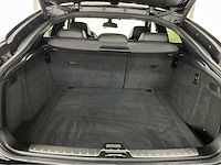 Bmw x6 m e71 | 4.4 v8 biturbo | 555 pk | 2013 | adaptive drive | head up display | comfort access | soft close | top view | btw auto - afbeelding 26 van  45