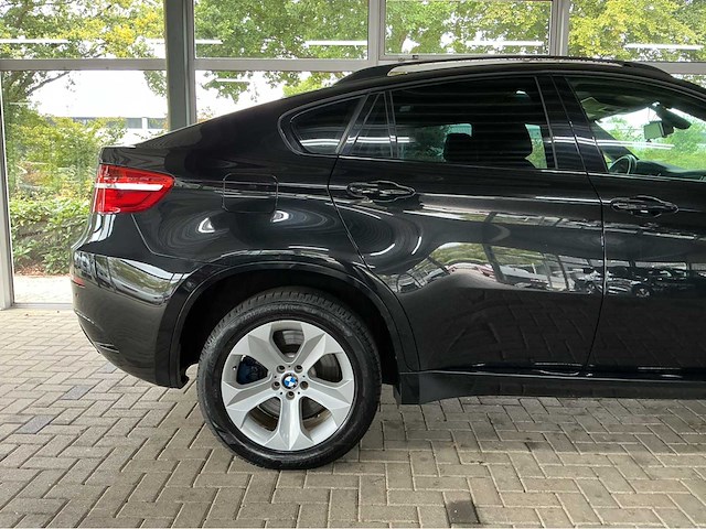 Bmw x6 m e71 | 4.4 v8 biturbo | 555 pk | 2013 | adaptive drive | head up display | comfort access | soft close | top view | btw auto - afbeelding 41 van  45