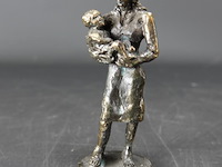 Bronzen moeder met kind