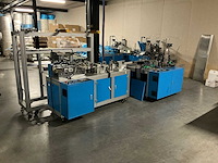 Buiten gebruik gestelde mondkapjes productielijn - afbeelding 1 van  12