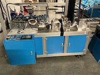 Buiten gebruik gestelde mondkapjes productielijn - afbeelding 3 van  12