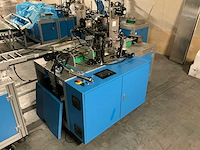 Buiten gebruik gestelde mondkapjes productielijn - afbeelding 4 van  12