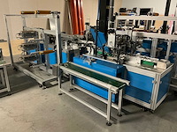 Buiten gebruik gestelde mondkapjes productielijn