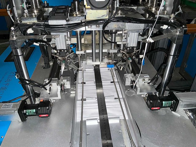 Buiten gebruik gestelde mondkapjes productielijn - afbeelding 6 van  14