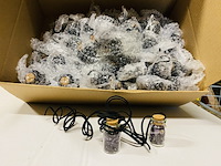 Ca. 100x geschenkflesjes aan koord met amethist - afbeelding 1 van  3