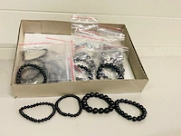 Ca. 20x shungiet kogelarmbanden