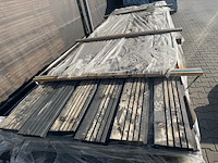 Ca. 20x vuren channelsiding zwart gecoat, 21x130mm, lengte 300cm - afbeelding 1 van  3