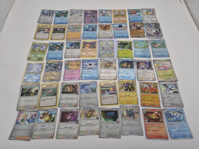 Ca. 48x pokémon kaarten: zeldzame, vintage, holo's en overig - afbeelding 1 van  13