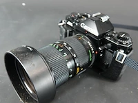 Canon a-1 spiegelreflexcamera uitgerust met een canon new fd 35-105mm f/3.5 zoomlens - afbeelding 2 van  8