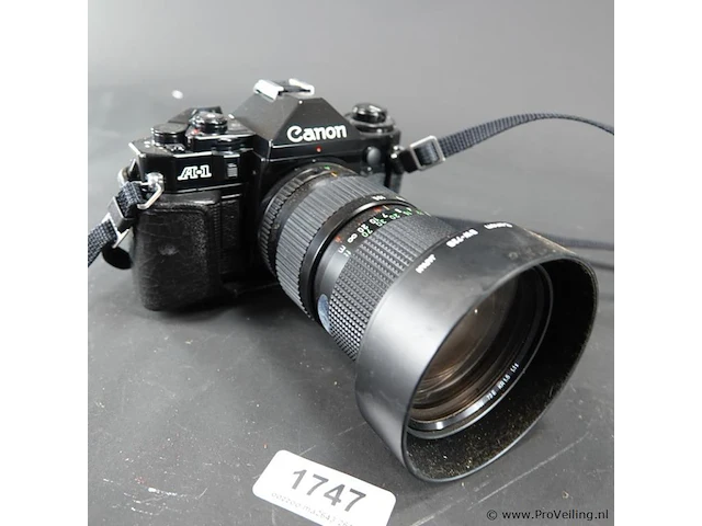 Canon a-1 spiegelreflexcamera uitgerust met een canon new fd 35-105mm f/3.5 zoomlens - afbeelding 3 van  8