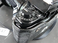 Canon a-1 spiegelreflexcamera uitgerust met een canon new fd 35-105mm f/3.5 zoomlens - afbeelding 6 van  8