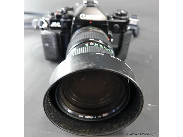 Canon a-1 spiegelreflexcamera uitgerust met een canon new fd 35-105mm f/3.5 zoomlens - afbeelding 8 van  8