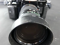 Canon a-1 spiegelreflexcamera uitgerust met een canon new fd 35-105mm f/3.5 zoomlens - afbeelding 8 van  8