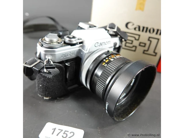 Canon ae-1 35mm analoge spiegelreflexcamera uitgerust met een canon fd 28mm f/2.8 s.c. groothoeklens - afbeelding 3 van  9