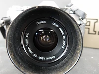 Canon ae-1 35mm analoge spiegelreflexcamera uitgerust met een canon fd 28mm f/2.8 s.c. groothoeklens - afbeelding 5 van  9