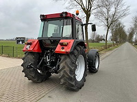 Case ih 856 xl 40 km / lucht vierwielaangedreven landbouwtractor - afbeelding 35 van  36