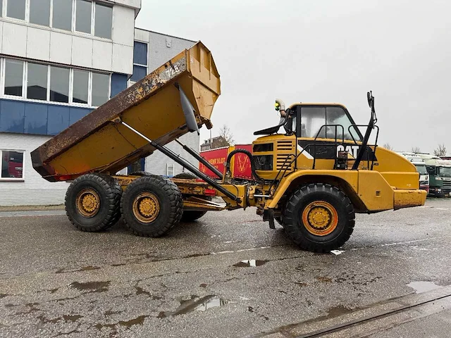Caterpillar 725 dumper truck - afbeelding 11 van  28