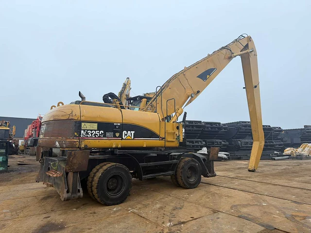 Caterpillar m3250 banden graafmachine - afbeelding 2 van  12