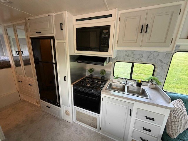 Chevrolet thor hurricane kampeerwagen 6.5 v8 intergraal camper p-687-zk - afbeelding 14 van  34