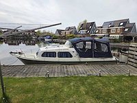 Consoleboot en visboot waterland 7 meter - benzinemotor - afbeelding 2 van  8