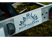 Crescent visboot met 25pk mercury efi buitenboordmotor en marlin boottrailer - afbeelding 1 van  8