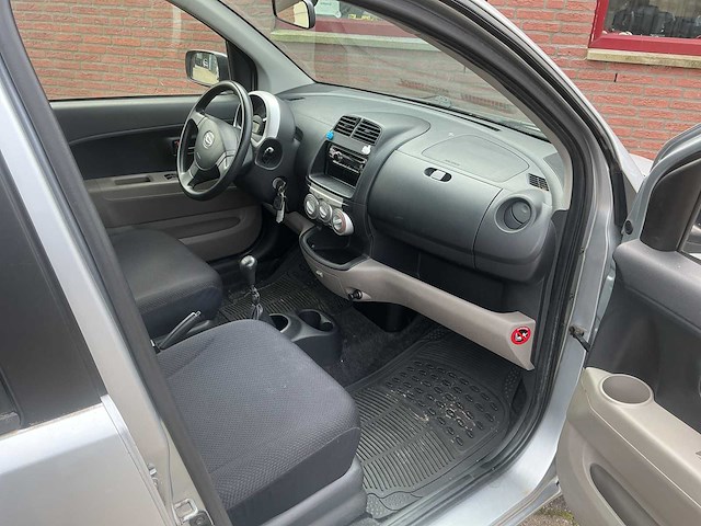 Daihatsu - 2006 - sirion 2 - 1.0-12v trend - personenauto - afbeelding 7 van  11