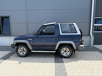 Daihatsu - feroza - 1.6 resin-top el ii - personenauto - 1991 - afbeelding 12 van  25