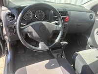 Daihatsu cuore 1.0 12v tokyo, 36-lx-ln - afbeelding 9 van  13