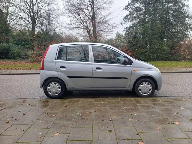 Daihatsu cuore 1.0 12v tokyo, 48-np-ft - afbeelding 1 van  13