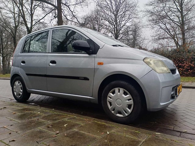 Daihatsu cuore 1.0 12v tokyo, 48-np-ft - afbeelding 9 van  13