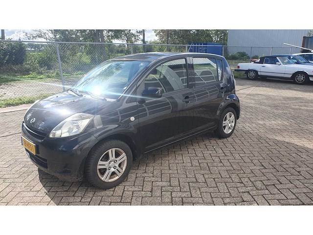 Daihatsu sirion 2 1.0-12v premium, 78-hfs-1 - afbeelding 1 van  12