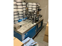 Diverse incomplete mondkapjes productie machines - afbeelding 13 van  20
