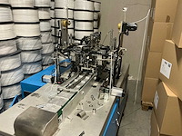 Diverse incomplete mondkapjes productie machines - afbeelding 14 van  20