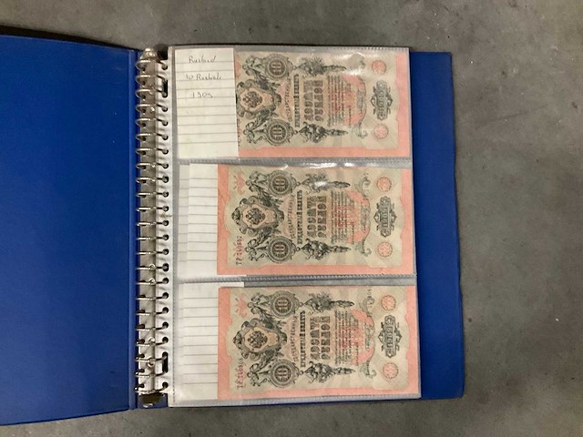 Diverse lectuur en map met buitenlandse valuta - afbeelding 9 van  12