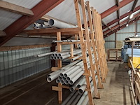 Diverse pvc buizen in stelling - afbeelding 7 van  16