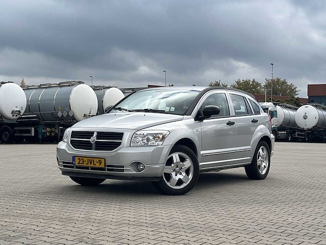 Dodge caliber 1.8 s 2009 | 23-jvl-9 - afbeelding 1 van  24