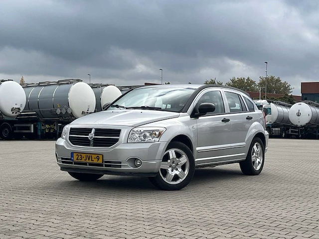 Dodge caliber 1.8 s 2009 | 23-jvl-9 - afbeelding 1 van  25