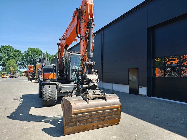 Doosan - 2017 - dx140w-5 - banden graafmachine - afbeelding 23 van  39