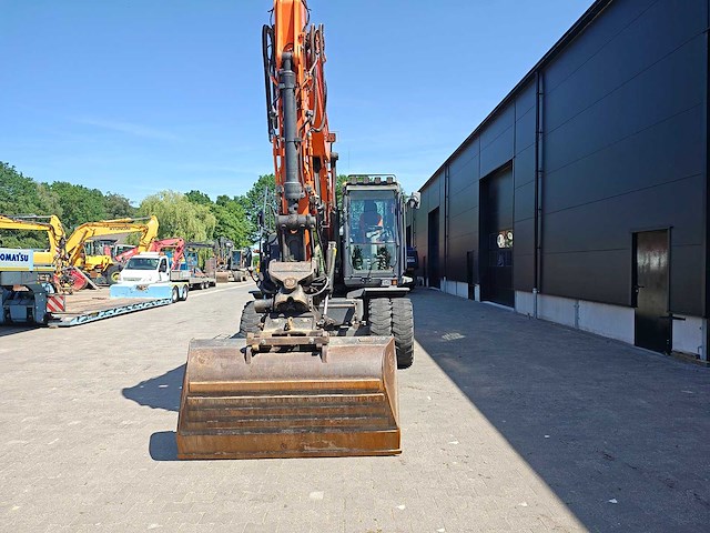 Doosan - 2017 - dx140w-5 - banden graafmachine - afbeelding 34 van  39