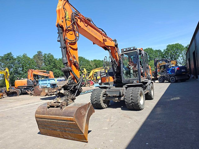 Doosan - 2017 - dx140w-5 - banden graafmachine - afbeelding 35 van  39