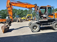 Doosan - 2017 - dx140w-5 - banden graafmachine - afbeelding 37 van  39
