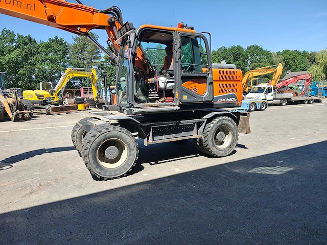 Doosan - 2017 - dx140w-5 - banden graafmachine - afbeelding 38 van  39