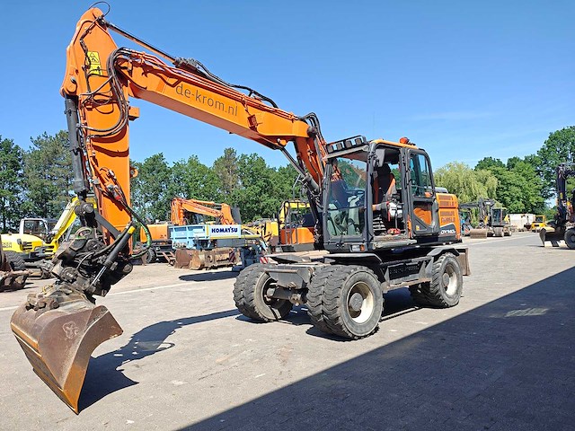 Doosan - 2017 - dx140w-5 - banden graafmachine - afbeelding 30 van  31