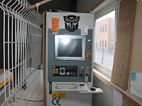 Drie-assig cnc bewerkingscentrum raptor 2142 met vacuümpomp, 8-koppige carrousel, boorunit en zaagunit. bo... - afbeelding 12 van  21