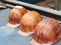 Drie bouwhelmen. - afbeelding 2 van  2