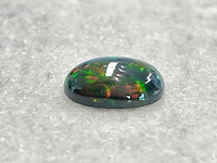 Edelsteen - 8.19 carat natuurlijke black opal