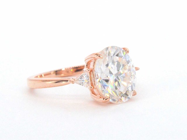 Entourage ring met een ovaal en briljant triangel - afbeelding 1 van  5