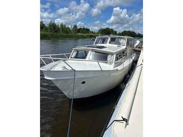 (externe locatie heerenveen ) motorkruiser ca. 9m met inboord diesel en yamaha 9,9pk - afbeelding 1 van  15